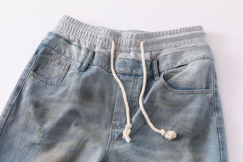 Men's Clothing Retro Washed Elastic Waistband Patchwork Denim Loose Jeans Dirty Ripped Design Long Pants_voghion.com