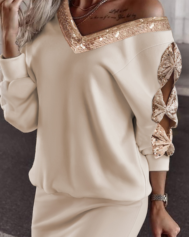 Completo da donna con top decorato con fiocco di perline e gonna con spacco_voghion.com