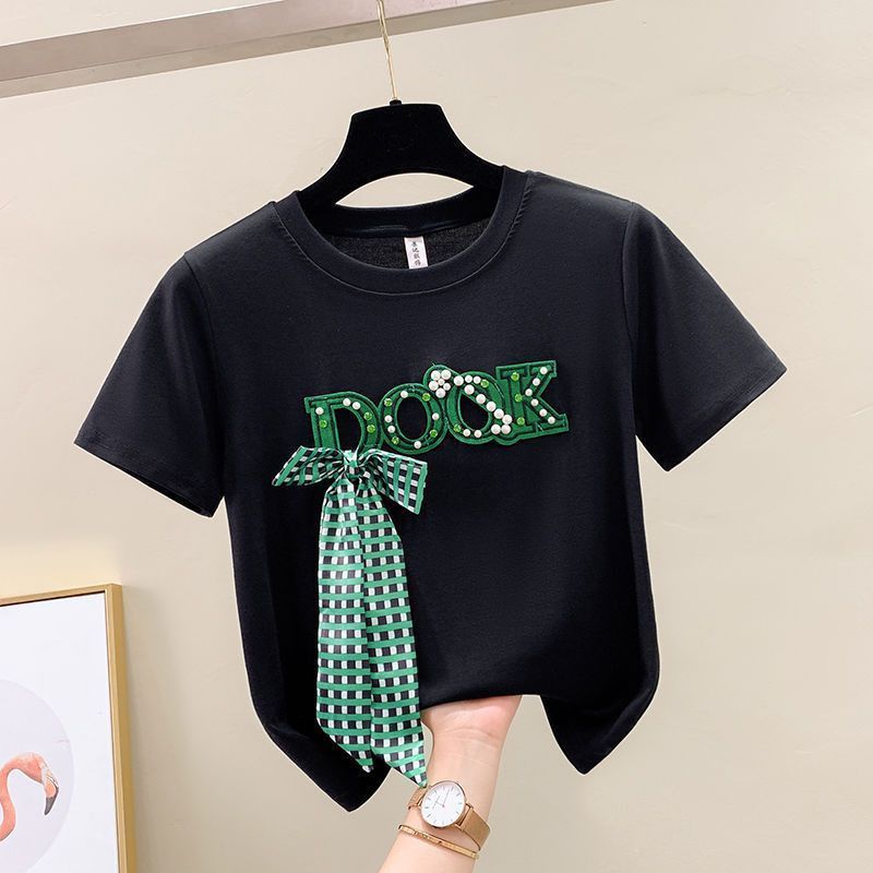 Roupas femininas nova camiseta de manga curta com laço frisado e saia jeans com borda crua dividida_voghion.com