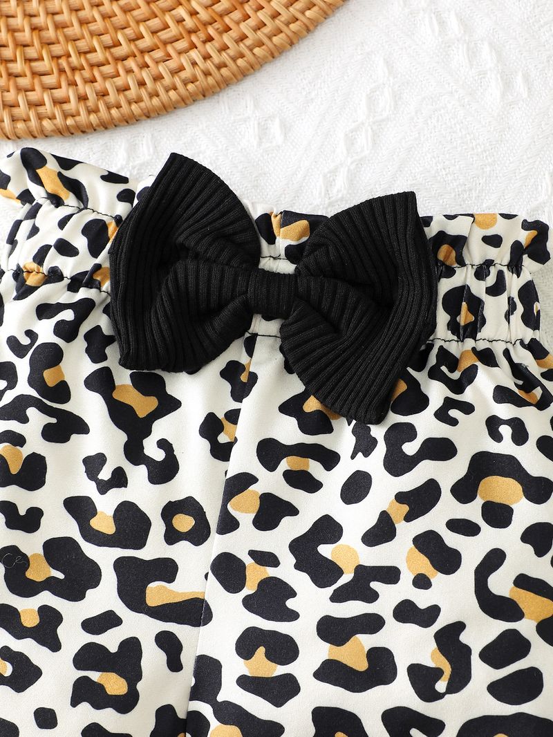 Esclusivamente per i nuovi arrivi transfrontalieri, set di top e pantaloncini con stampa leopardata per neonata, in tinta unita e molto venduto._voghion.com