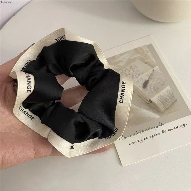 Anello per capelli dell'intestino crasso Semplice coda di cavallo in tessuto coreano di fascia alta Anello per capelli con bordo pressato in stile francese Instagram_voghion.com