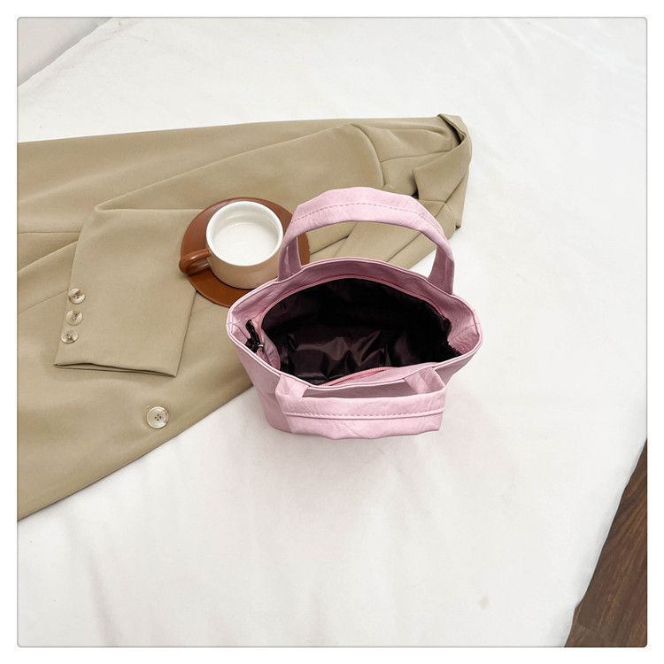 High-End 2025 Neue einfache Damen-Make-up-Tasche mit hohem Aussehen, einfarbig, süße Mini-Handtasche_voghion.com