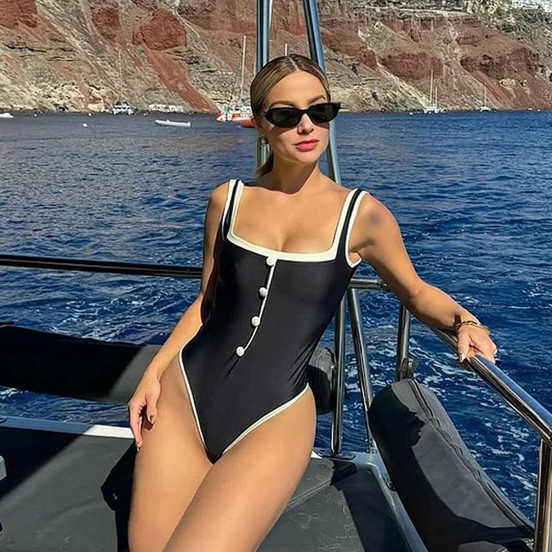 Maillot de bain une pièce noir et blanc pour femme, style simple et haut de gamme, avec petit parfum et boutons décoratifs_voghion.com