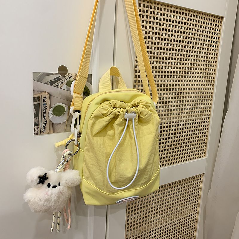 Summer High-End Commuter Phone Small For Women 2025 New Beige Lightweight Outdoor Canvas Crossbody Water Bottle Bag_voghion.com