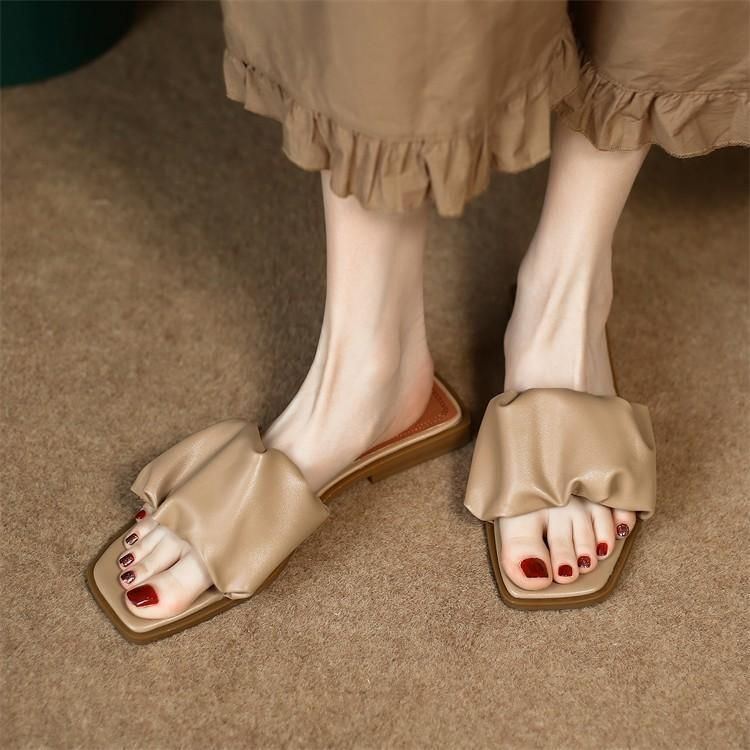 Sensation de marcher sur de la merde ! Assez confortables pour exploser avec ces chaussons plats à une ligne en abricot français pour une plage décontractée._voghion.com