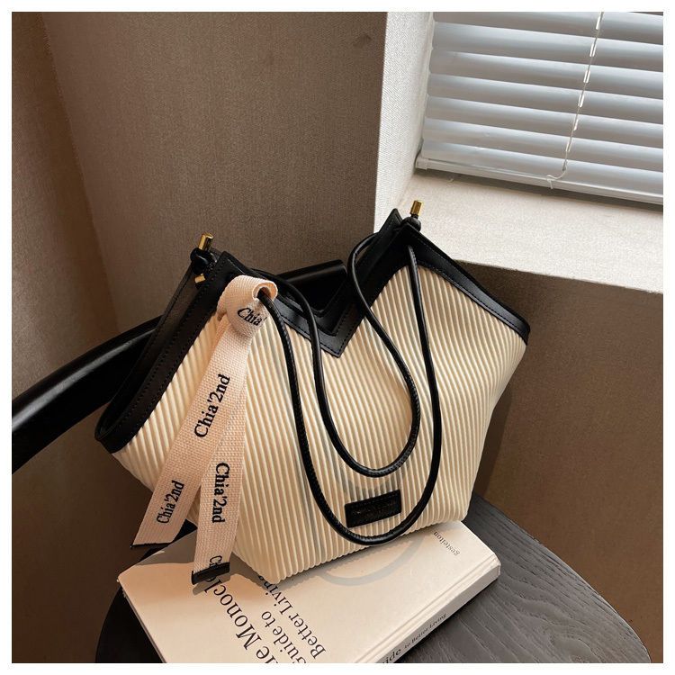 Borsa tote per studenti a spalla singola da pendolarismo in pelle versatile e casual da donna famosa su Internet del 2024 di grande capacità_voghion.com