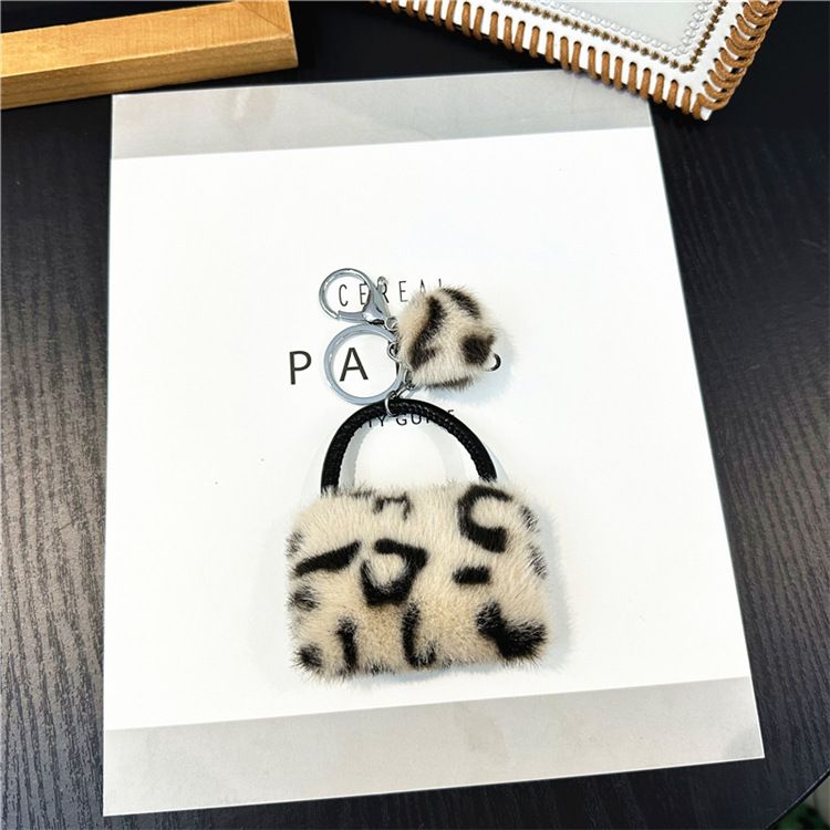 Portachiavi con ciondolo per borsa, motivo leopardato, creativo, per studenti, con ciondolo in peluche e cartone animato, portachiavi per auto, ciondolo con palla di pelo, accessori_voghion.com