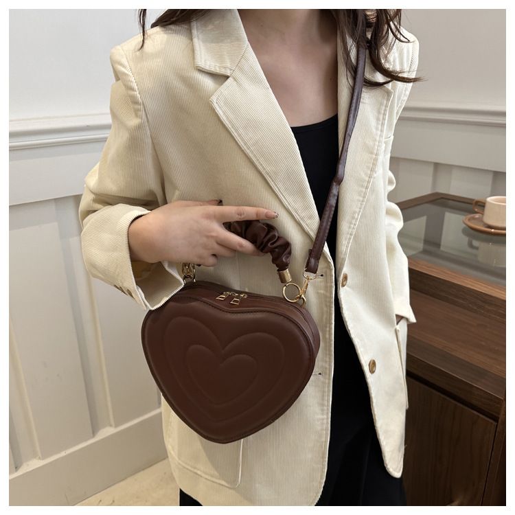 Indentatura semplice a forma di cuore carina tinta unita femminile cuore shopping moda plissettata borsa a tracolla_voghion.com