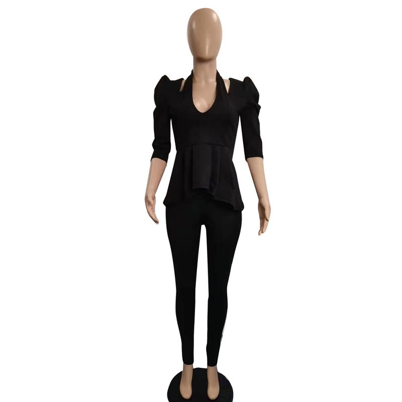 Completo da donna in due pezzi con blazer con volant sulle spalle e pantaloni lunghi_voghion.com