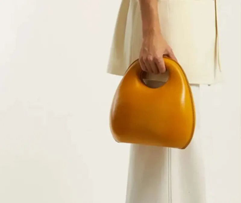 Borsa a tracolla rotonda con patta, modello conchiglia, modello retrò, da donna, modello 2025, modello a tracolla_voghion.com