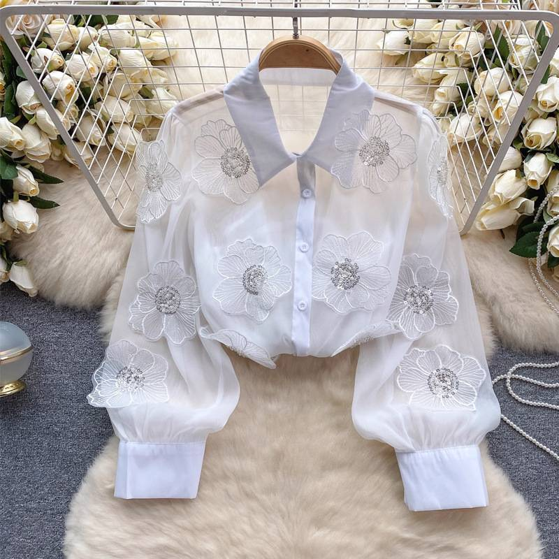 Camicetta floreale con paillettes e perline da donna_voghion.com