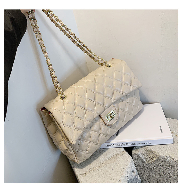 Texture di nicchia in stile designer con un tocco avanzato, piccola borsa con catena a griglia Xiangling, borse da donna trendy con tracolla diagonale a spalla singola_voghion.com