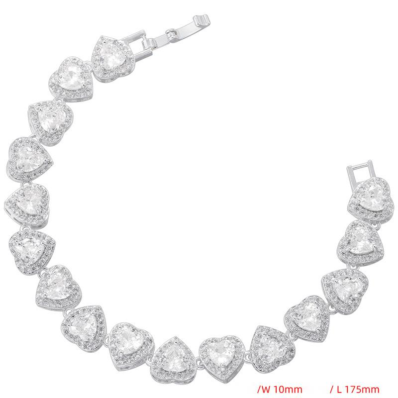 Collana con bracciale a forma di cuore in zirconio intarsiato in rame, vendita calda, set di gioielli hip-hop a forma di cuore di pesca VL598-599_voghion.com