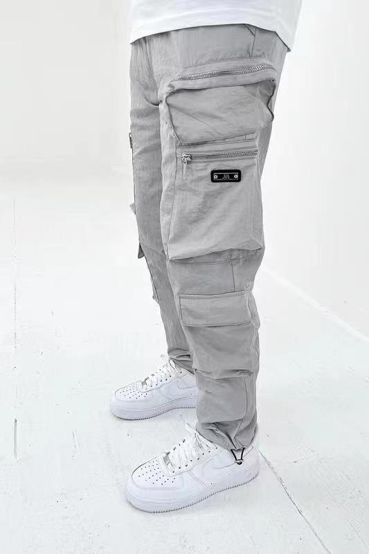 2024 Men's casual versatile leggings sports with large pockets, zipper decoration, workwear pants_voghion.com