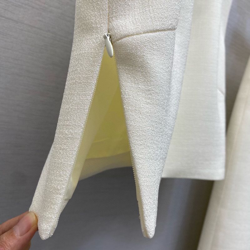 Ensemble deux pièces haut court sans manches et jupe abricot, nouvelle collection tendance haut de gamme 25SS_voghion.com