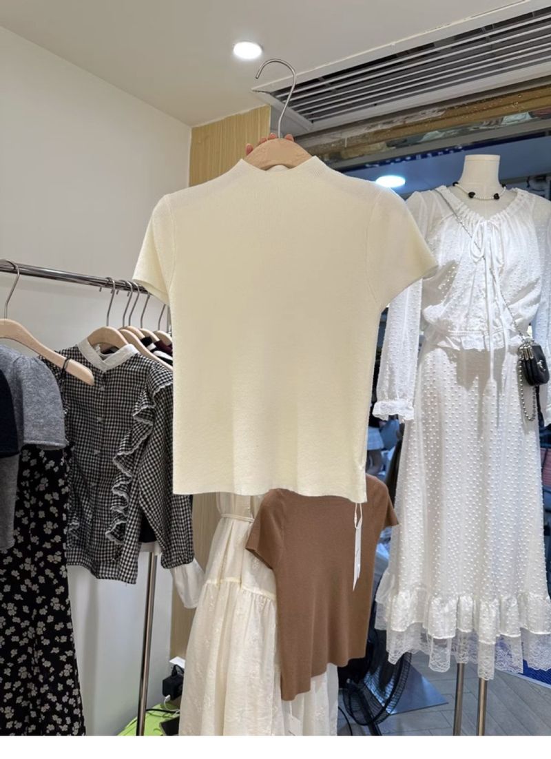 Camiseta feminina de seda francesa fina, gola alta, manga curta, estilo moderno e sofisticado para o verão_voghion.com