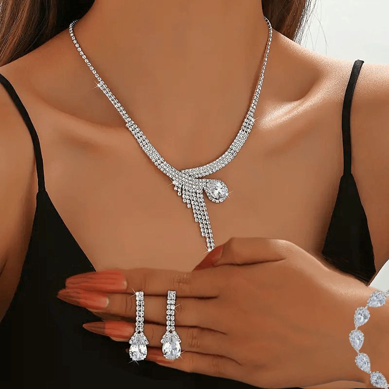 Collana orecchini bracciale con zirconi a goccia intarsiati di lusso e borsa da sera lucida, abito da banchetto in quattro pezzi_voghion.com