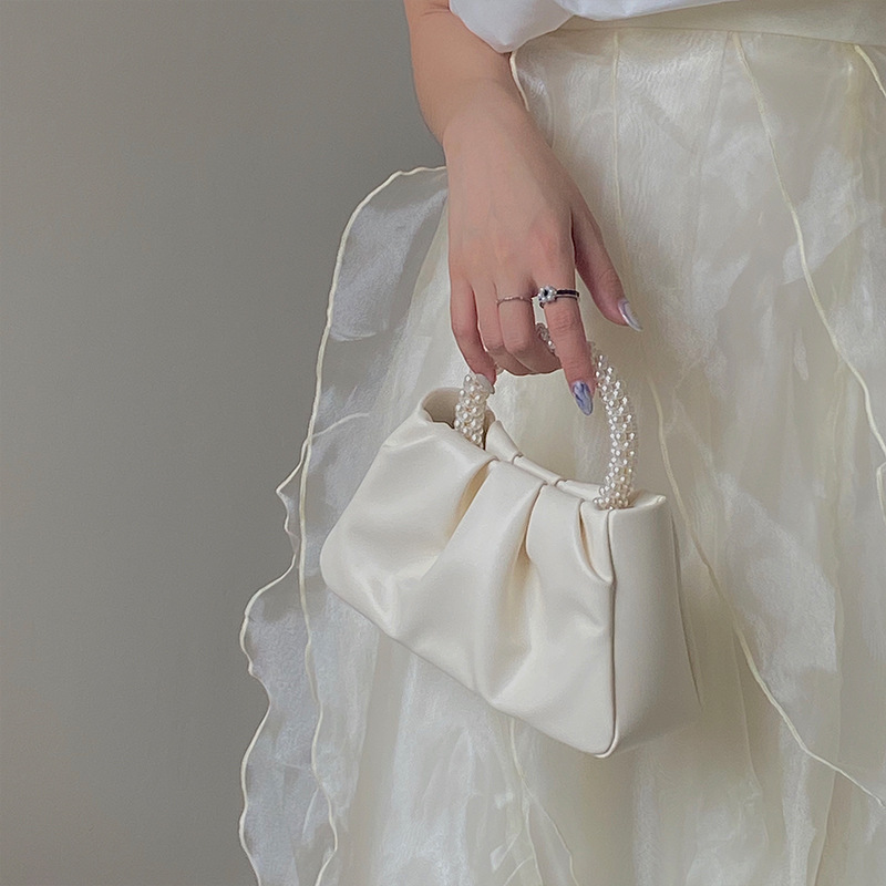 2024 Mini borsa a tracolla singola a spalla singola per telefono cellulare piegata alla moda da donna piccola perla_voghion.com