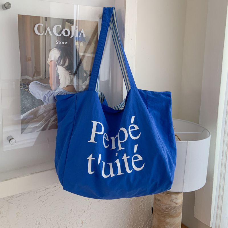 Sac fourre-tout décontracté en nylon de style coréen, sac à main à imprimé lettre tendance, sac à bandoulière simple rayé double face de célébrités d'Internet_voghion.com