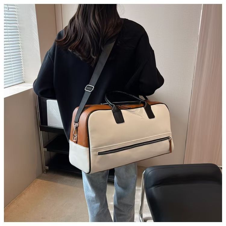 Designer Travel Bag Is Made Of High-quality Leather And Offers Ample Capacity, Making It An Ideal Choice For Both Travel And Vacation._voghion.com