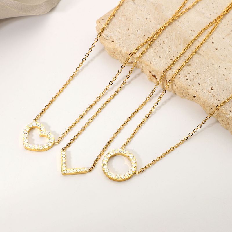 Collana con ciondolo in zirconia cubica con collare in acciaio inossidabile dorato a forma di cuore circolare geometrico cavo per donna_voghion.com