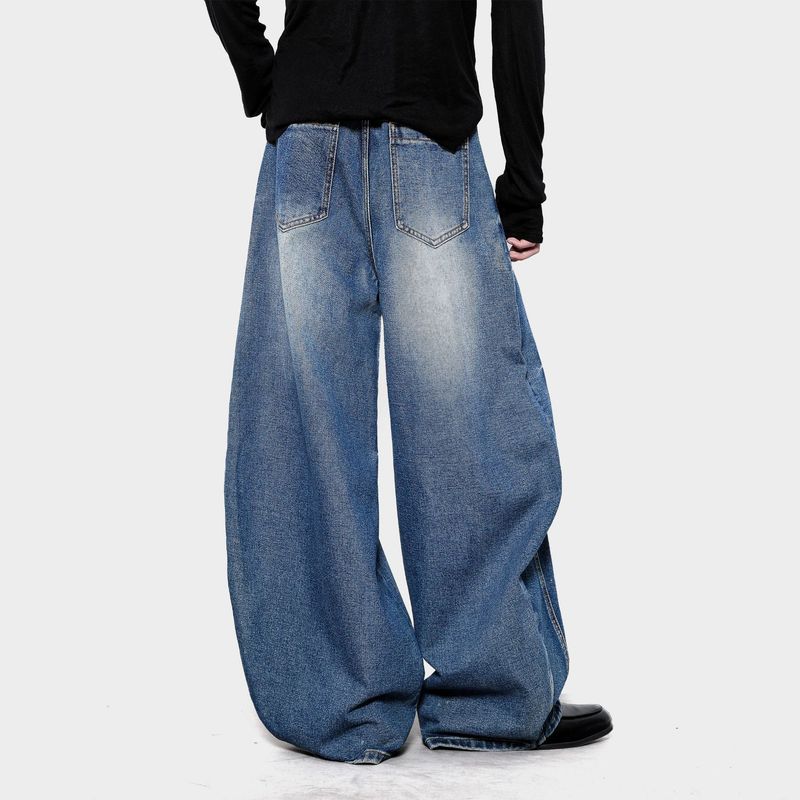 Vaqueros de corte bota lavados vintage unisex: pantalones vaqueros holgados de cintura alta con corte limpio, bigotes de gato y detalles desgastados._voghion.com