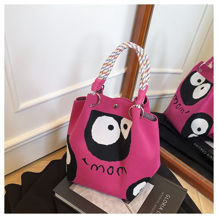 Borsa a tracolla casual versatile e di grande capacità, in maglia trapuntata in bianco e nero, con design di nicchia_voghion.com