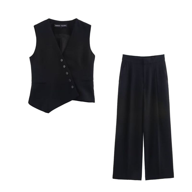 Traje de mujer de moda con chaleco asimétrico sencillo con cuello en V y pantalón ancho plisado._voghion.com