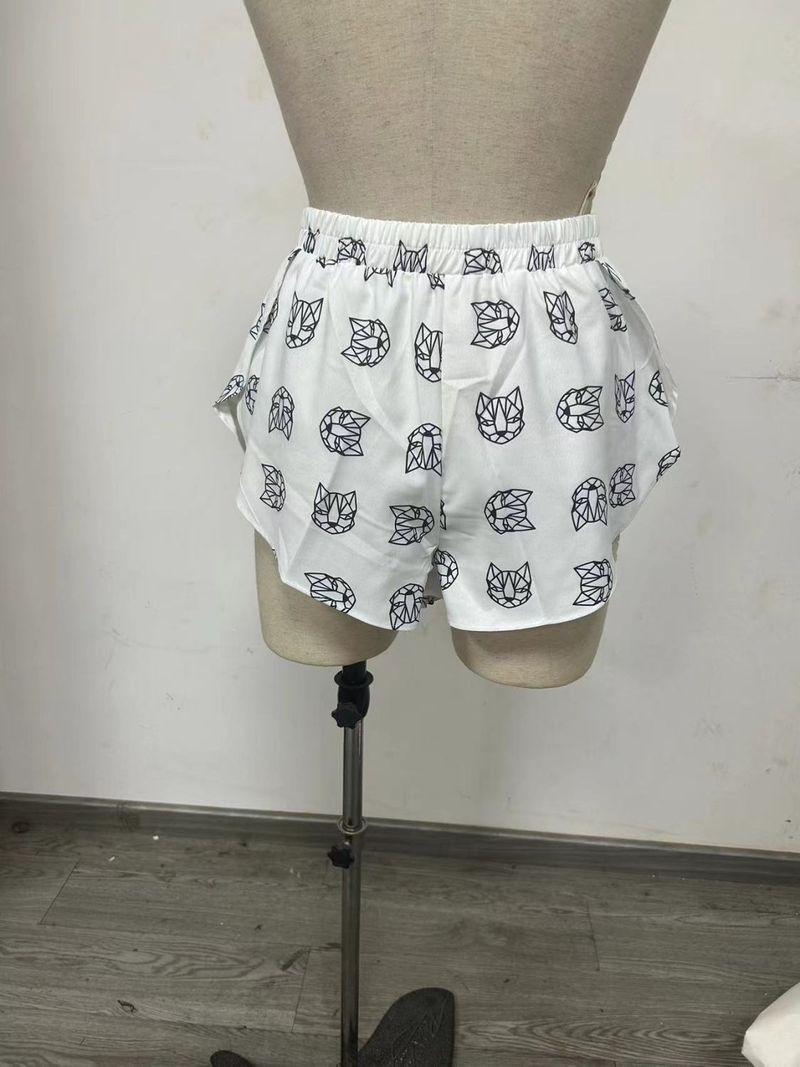 Completo da casa da donna composto da top e pantaloncini con scollo a V, stampati e allacciati, stile ampio_voghion.com