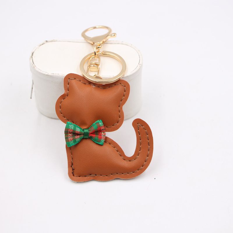 Nuovo ciondolo portachiavi in pelle a forma di papillon con gatto, accessorio per zaino, portafoglio_voghion.com