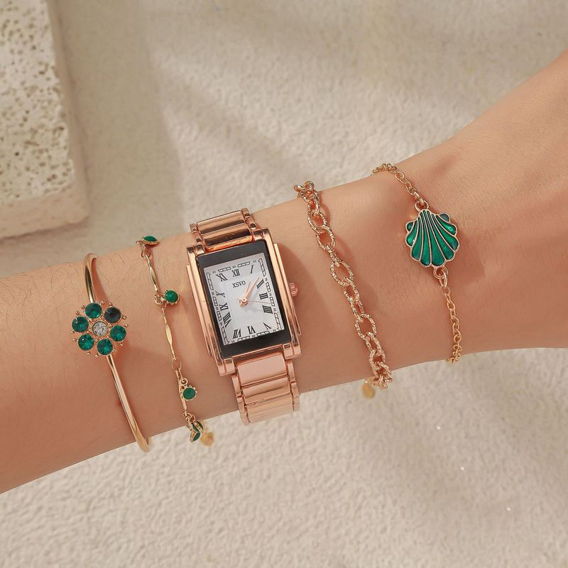Orologio al quarzo in acciaio Intergold quadrato alla moda da donna con calibrazione, set di gioielli con bracciale a forma di piccolo fiore verde_voghion.com