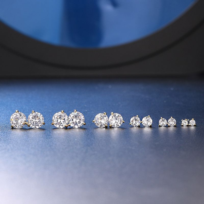 Orecchini unisex semplici e freschi a tre griffe rotondi con diamanti piccoli orecchini_voghion.com