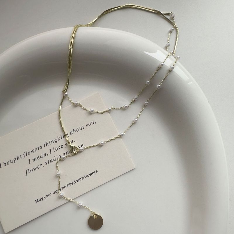 2024 nuova collana di perle finte impilabili romantiche francesi per le donne collana clavicola abbinata collana di design di nicchia gioielli_voghion.com