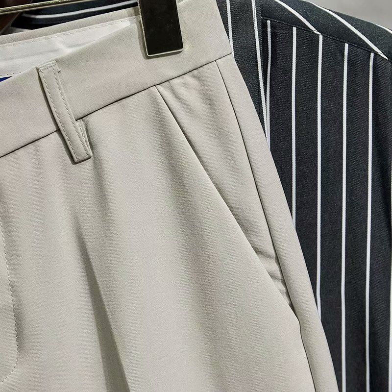 Pantaloni da uomo di design con lo stile di Hong Kong che entra nella moda, pantaloni a gamba dritta per la perdita di peso, pantaloni western drappeggiati casual e alla moda._voghion.com