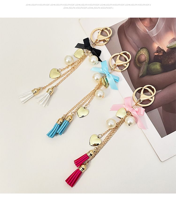 Neue exquisite Bowknot Quaste Herz Auto Schlüsselanhänger Telefon Fall Tasche Anhänger kleine Geschenk Dekoration_voghion.com