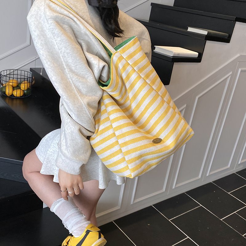 Borse a tracolla da donna: una borsa tote casual a righe con blocchi di colore, dallo stile dolce e rilassato, borsa a tracolla singola bifacciale_voghion.com