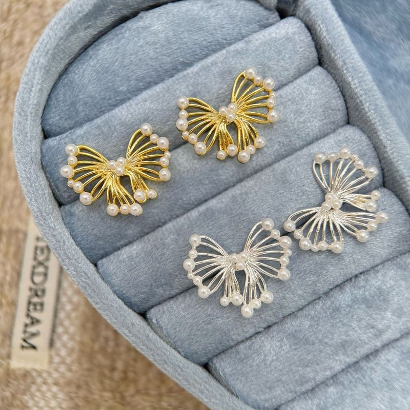 Fashionable Luxurious Hollow Butterfly High-end Temperament, Pearl With Simple And Cold Ins, Niche Earrings For Women_voghion.com