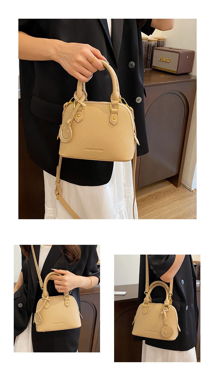 Trendy temperament solid color hand-held shell 2024 new high-end multi-color single shoulder crossbody women's bag_voghion.com