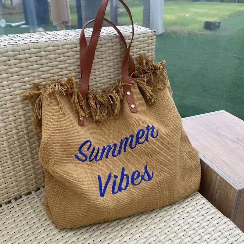 Borsa a mano in stile coreano, nuova, versatile, in tela, ricamata, con nappa, da donna, in tessuto, da spiaggia_voghion.com
