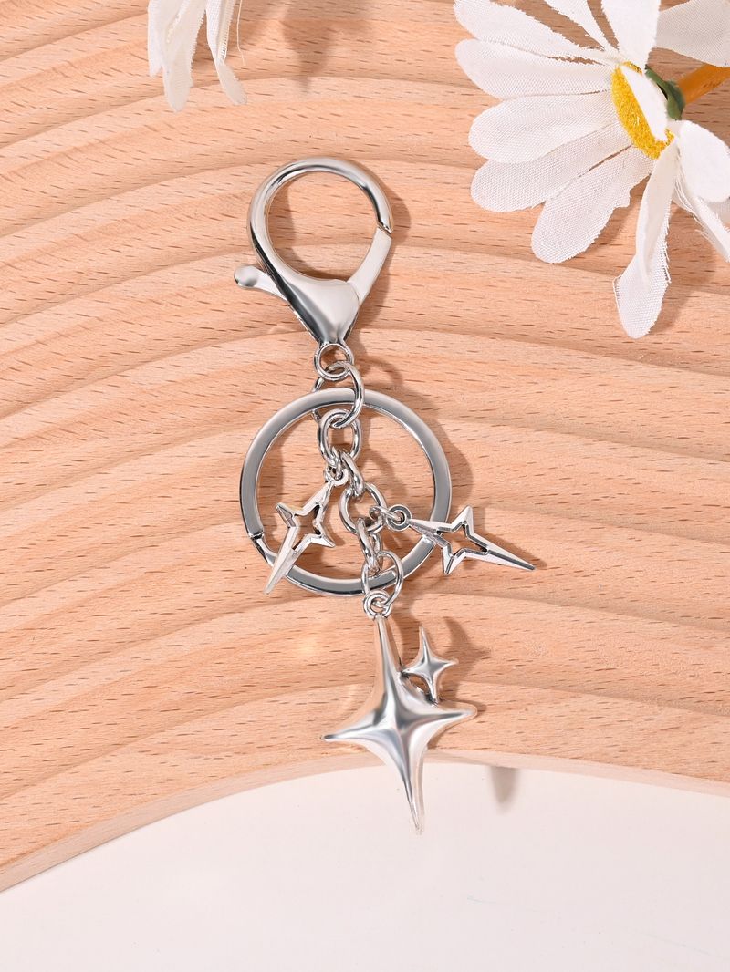 Colgante de llavero para coche con forma de estrella de cuatro puntas, estilo coreano, sencillo, ideal como regalo de San Valentín._voghion.com