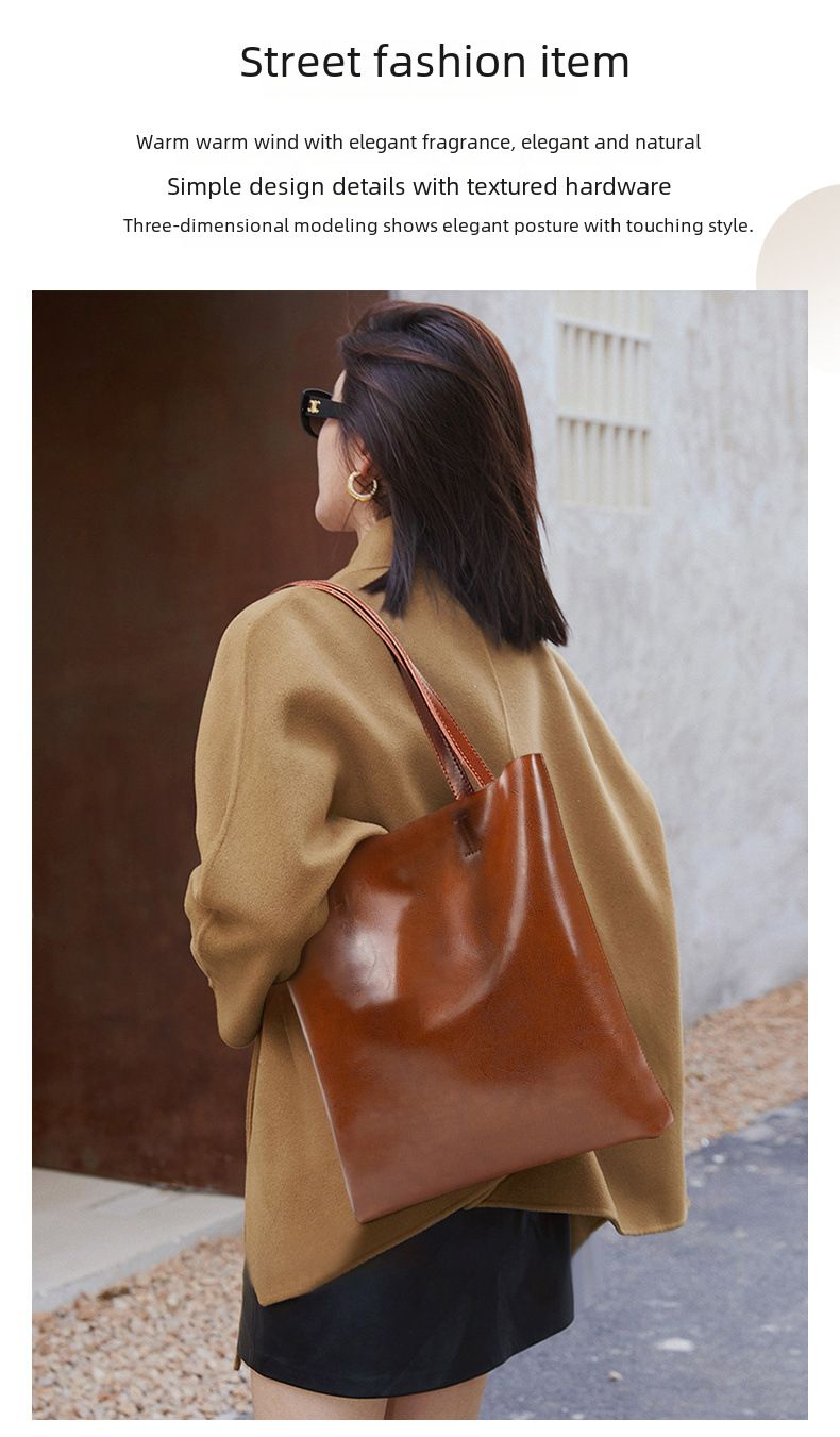 2024 Spring and Summer New Cowhide Women's Bag Fashion Women's Leather Bag Simple Tote Bag Large Capacity Portable Shopping Bag_voghion.com