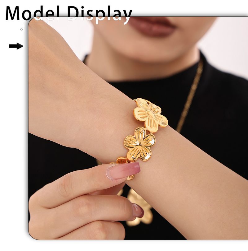 Sieradenset voor dames, gouden bloemenring, ketting en armband, roestvrij staal, PVD-geplateerd, echt goud, kleurbehoud sieraden_voghion.com