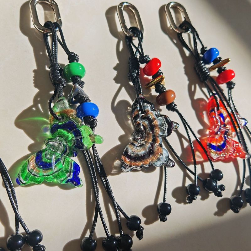 Ciondolo per borsa a forma di farfalla, portachiavi con nappa alla moda, ciondolo per borsa in corda intrecciata con perline di vetro_voghion.com