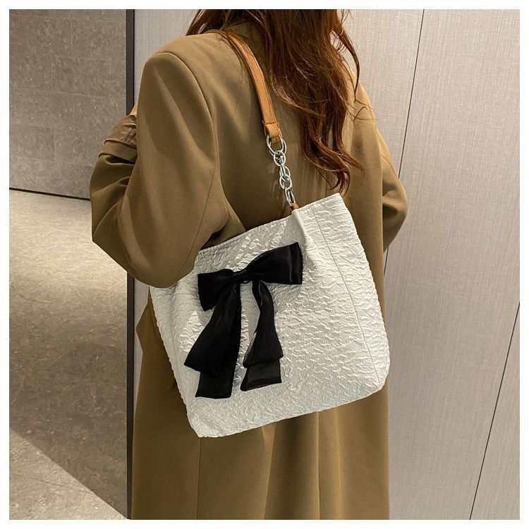 Borsa a mano versione coreana per donna 2022 nuova borsa a tracolla con fiocco di nicchia estiva grande capacità borsa in tela carina singola_voghion.com