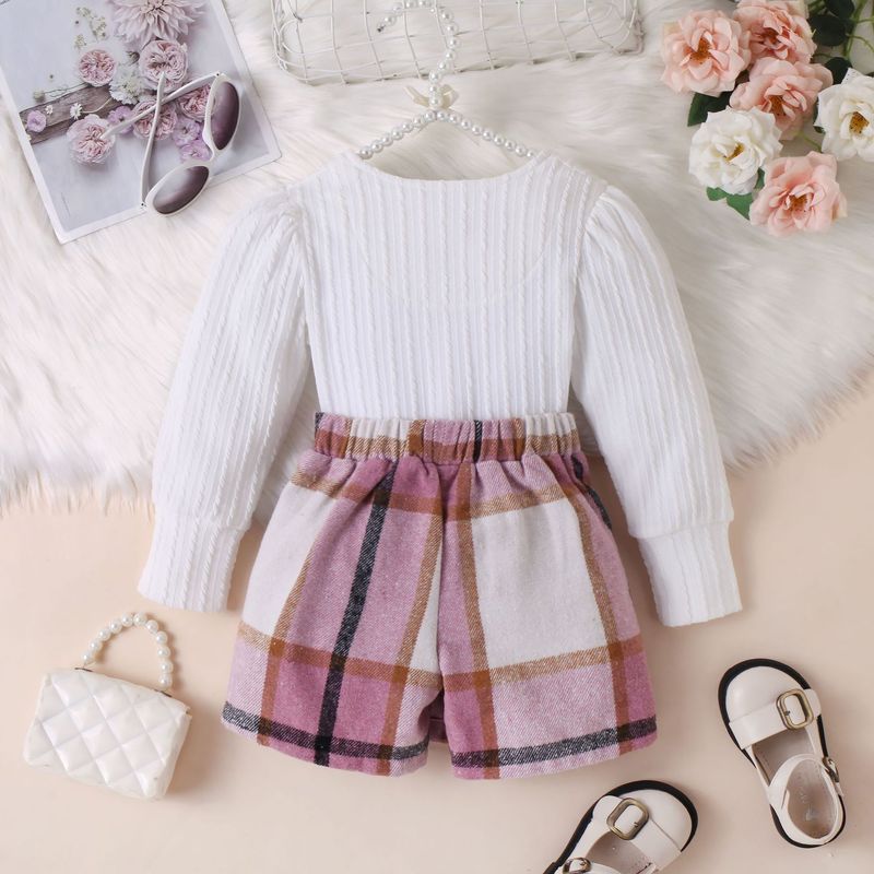 Completo da bambina con maglia a maniche lunghe con scollo quadrato e gonna a pantaloncini irregolari a quadri, in morbido cotone, da 2 pezzi, per la primavera e l'autunno._voghion.com