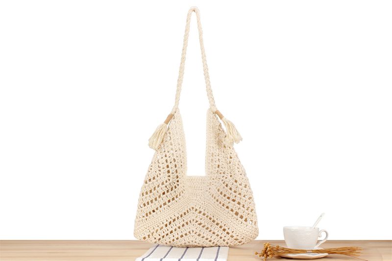 Borsa di paglia alla moda intrecciata a mano borsa a triangolo cavo di nicchia borsa a tracolla per pendolari borsa per le vacanze al mare_voghion.com