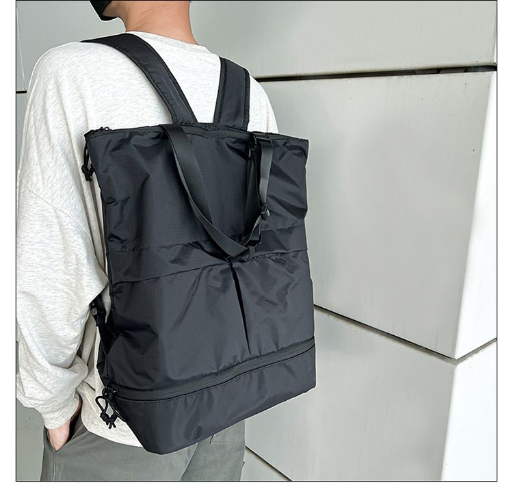 Zaino per uomini e donne Borse da trasporto per pendolari Borsa a spalla singola tinta unita Zaino in nylon antispruzzo di grande capacità Alla moda_voghion.com