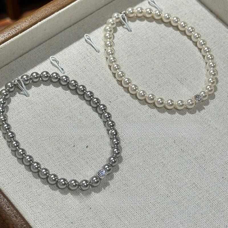 Liten utsøkt zirkon sukkerbit Shijia perle elastisk armbånd lys luksus fransk elegant armbånd jenter smykker engros_voghion.com