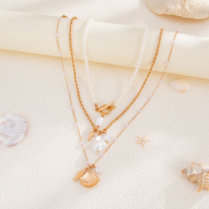 Halskette Damen Goldene Halskette Anhänger Halskette Gold Mode Perle Muschel Fisch Strand Stil Halskette Design Mehrschichtige Schlüsselbeinkette_voghion.com