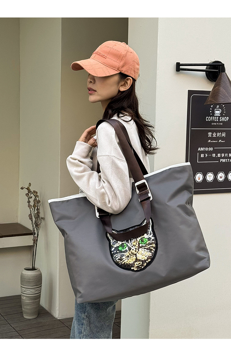 New Portable Travel Shopping Bag For Outgoing Large Capacity Storage Handbag One Shoulder Shining Cat Head Tote Women's Bag_voghion.com